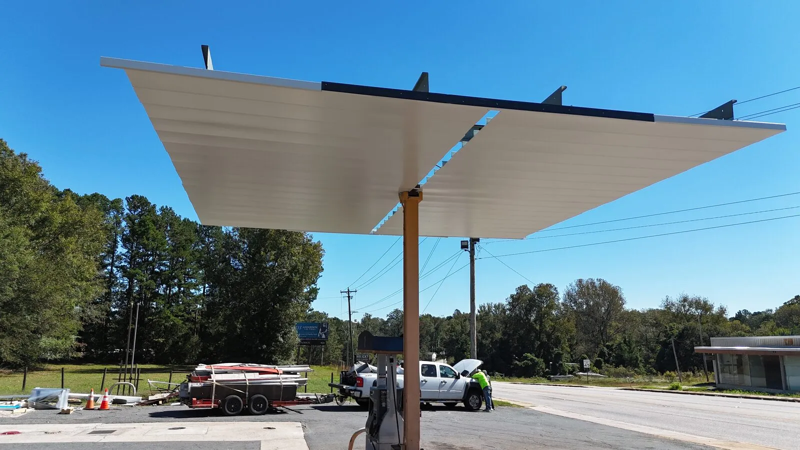 New fuel canopy installation at a commercial gas station