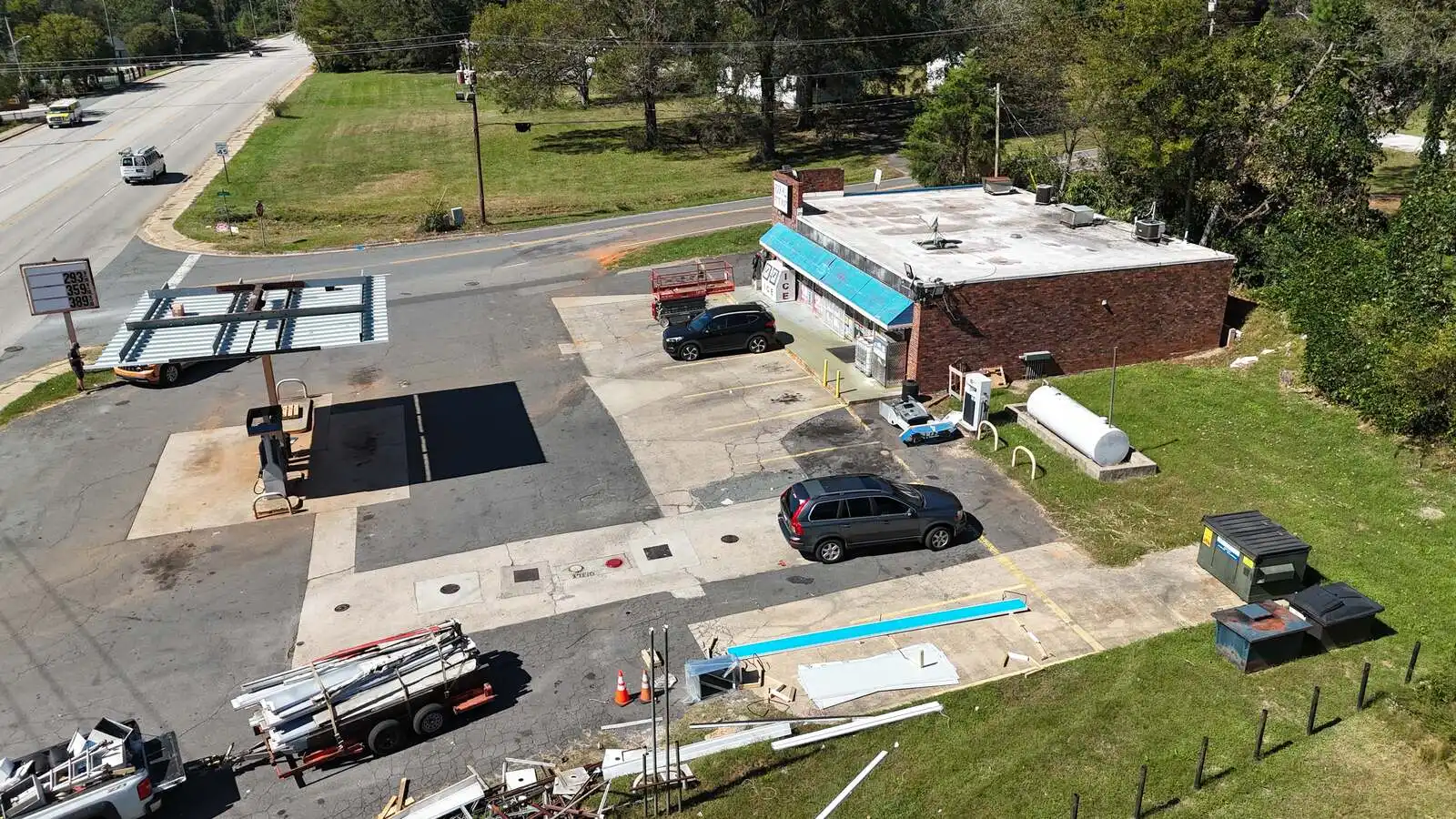 Aerial view of a gas station renovation with canopy structure staged for install